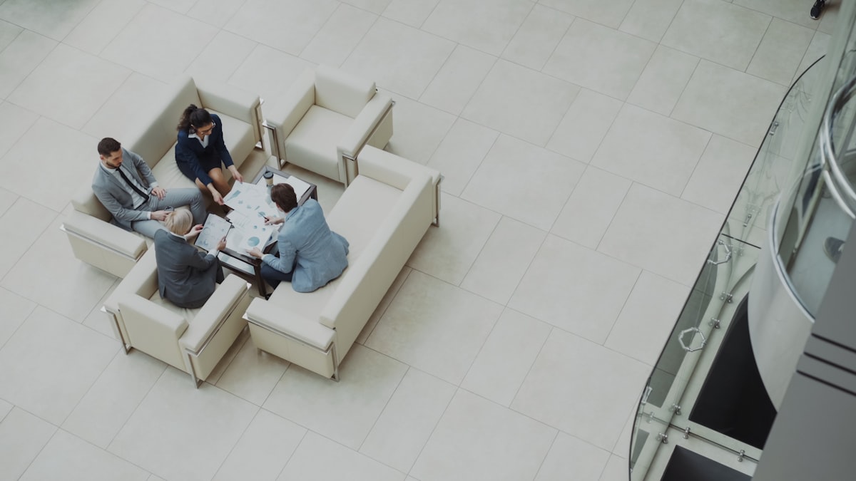 Business professionals reviewing charts during a consultation meeting