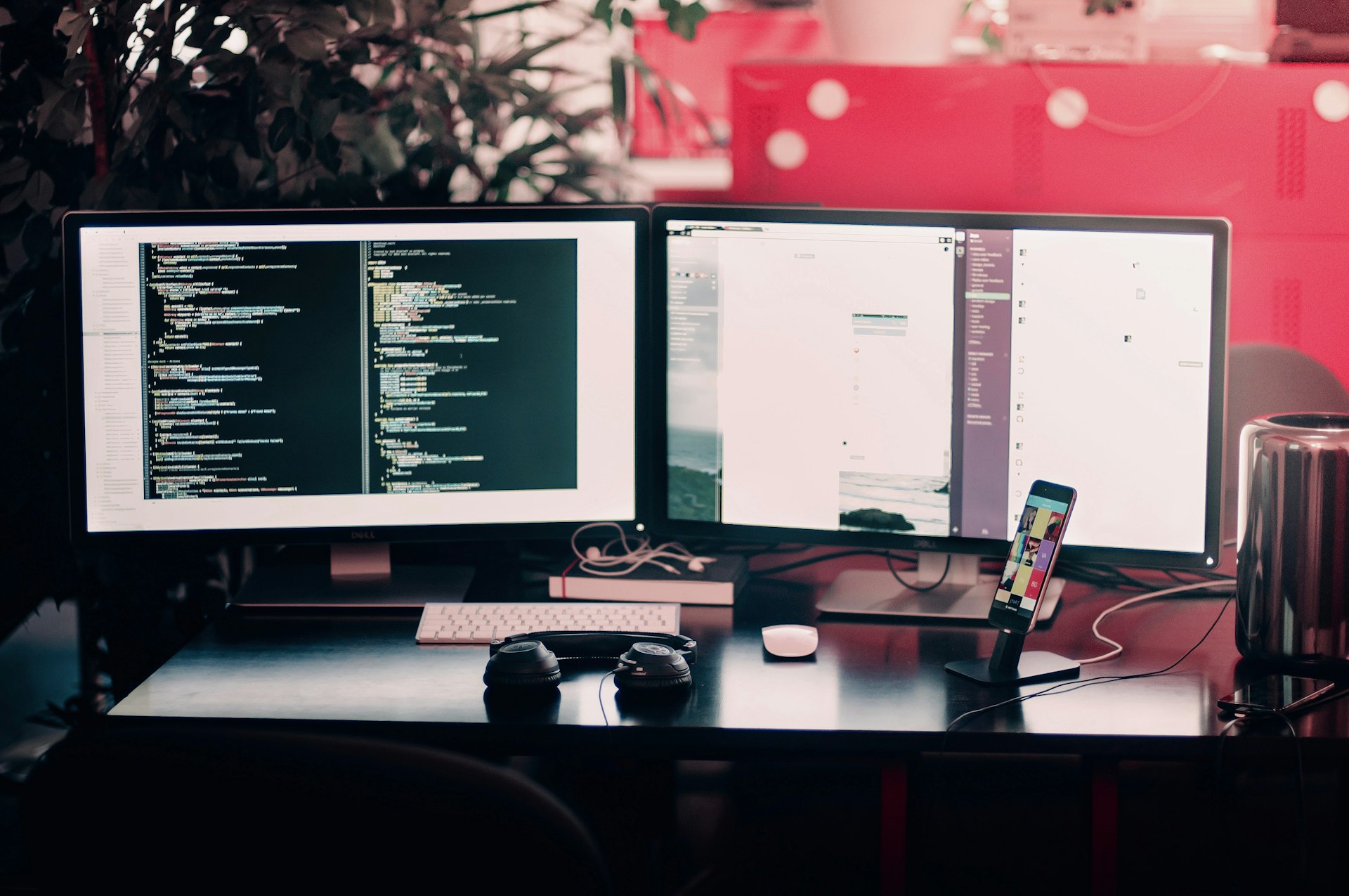 Dual-monitor coding workstation in a dark studio environment